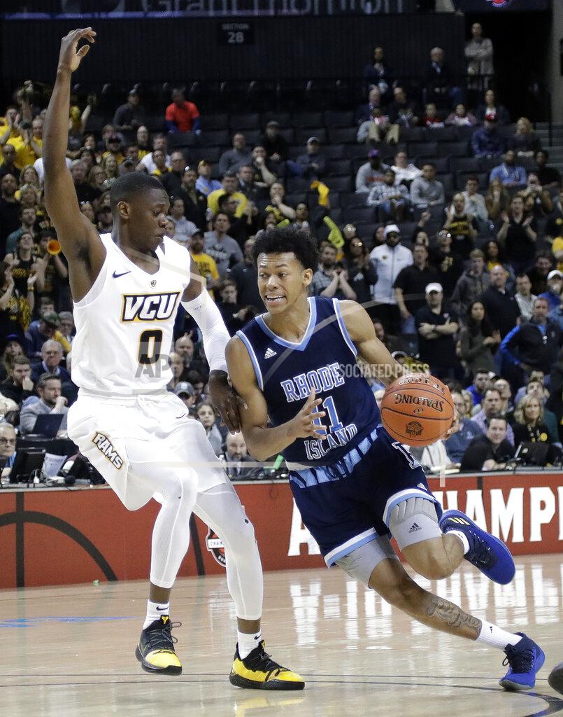 Frank Franklin Ii Rhode Island's Jeff Dowtin (11) drives past VCU's De'Riante Jenkins (0) during the second half of an NCAA college basketball game in the Atlantic 10 men's tournament Friday, March 15, 2019, in New York. Rhode Island won 75-70. (AP Photo/Frank Franklin II)