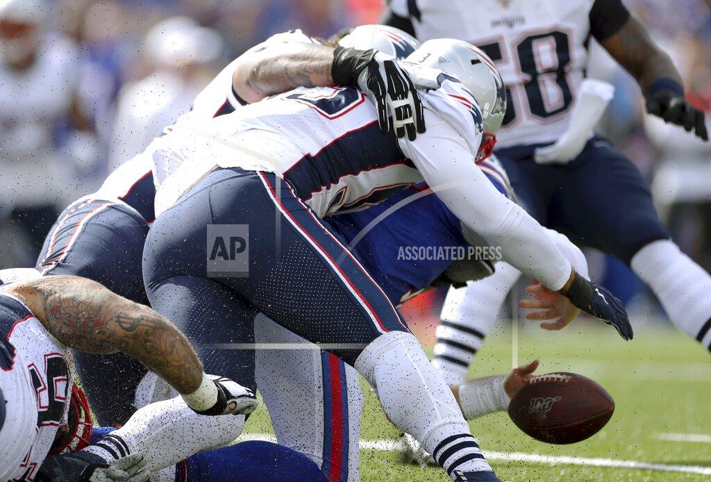 Ron Schwane Buffalo Bills quarterback Josh Allen fumbles as he is tackled by New England Patriots linebacker Kyle Van Noy in the first half of an NFL football game, Sunday, Sept. 29, 2019, in Orchard Park, N.Y. The Bills recovered the fumble. (AP Photo/Ron Schwane)