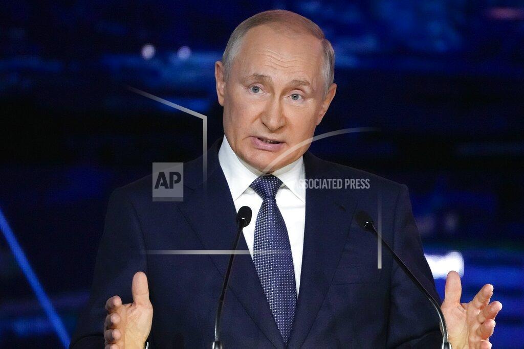 Alexander Zemlianichenko FILE - In this Sept. 3, 2021, file photo, Russian President Vladimir Putin gestures as he delivers his speech during a plenary session at the Eastern Economic Forum in Vladivostok, Russia. The embattled opposition groups admit the Kremlin has left them few options and resources ahead of the Sept. 19 election that is widely seen as a key to Putin’s effort to cement his hold on power. But they still hope to erode the dominance of the ruling United Russia party in the State Duma, or parliament. (AP Photo/Alexander Zemlianichenko, Pool, File)