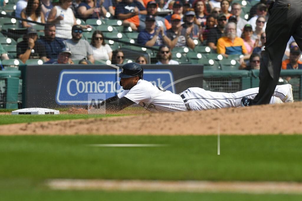 Jose Juarez Detroit Tigers' Victor Reyes slides safely into third base on a single from Akil Baddoo in the fifth inning of a baseball game against the Tampa Bay Rays, Sunday, Sept. 12, 2021, in Detroit. (AP Photo/Jose Juarez)