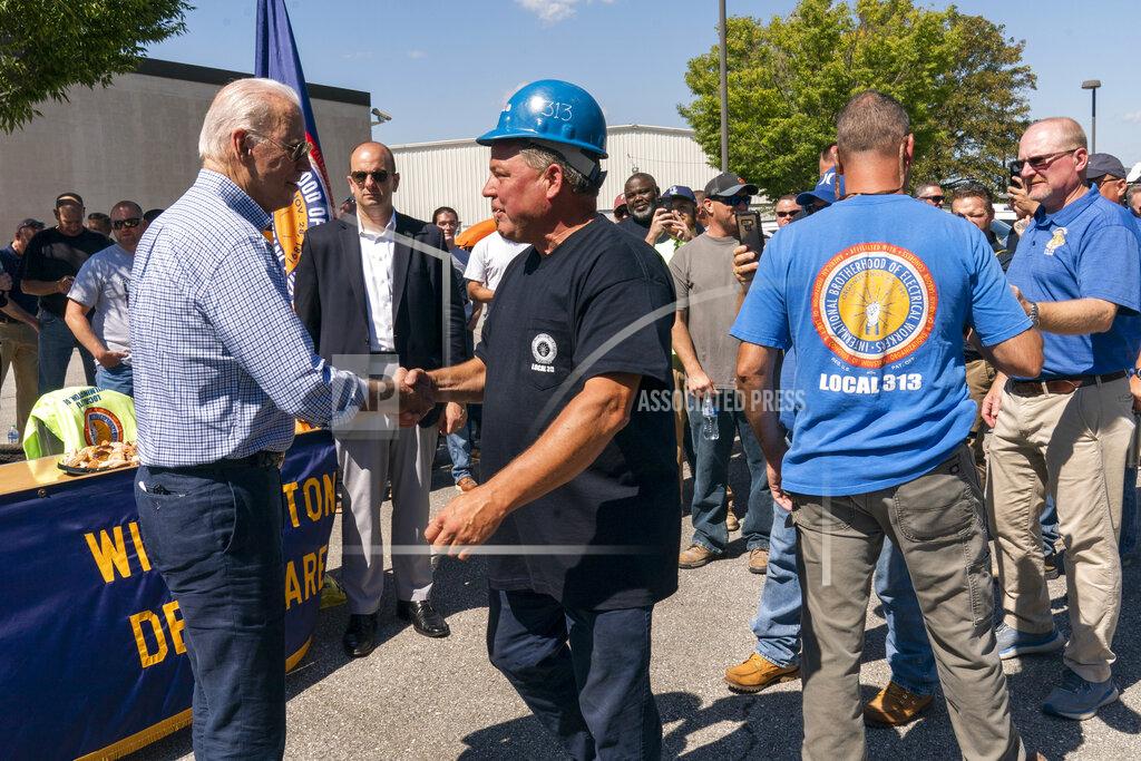 Manuel Balce Ceneta President Joe Biden greets labor union members of the International Brotherhood of Electrical Workers (IBEW) Local 313 in New Castle, Del., commemorating Labor Day, Monday, Sept. 6, 2021. (AP Photo/Manuel Balce Ceneta)