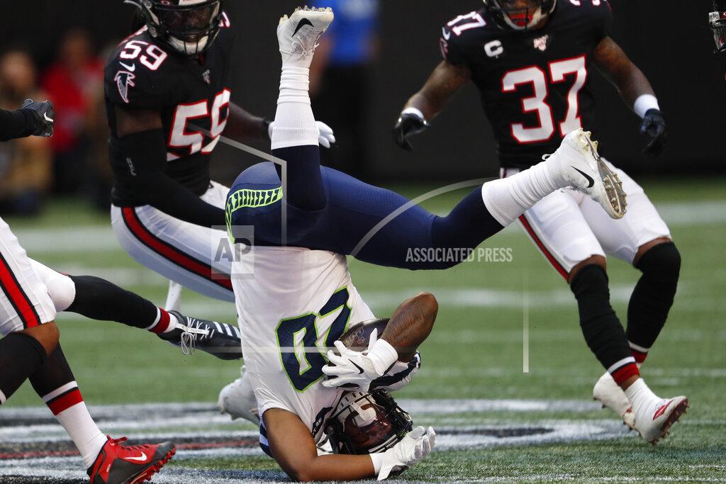 John Bazemore Seattle Seahawks running back Rashaad Penny (20) hits the turf against the Atlanta Falcons during the first half of an NFL football game, Sunday, Oct. 27, 2019, in Atlanta. (AP Photo/John Bazemore)