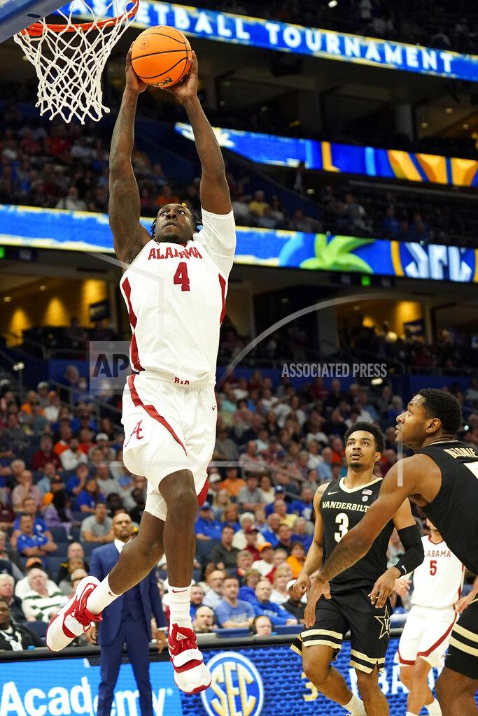 Chris O'meara Alabama forward Juwan Gary (4) goes up for a dunk against Vanderbilt during the first half of an NCAA men's college basketball Southeastern Conference tournament game Thursday, March 10, 2022, in Tampa, Fla. (AP Photo/Chris O'Meara)