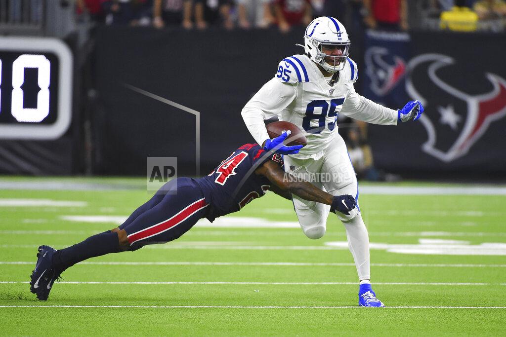 Eric Christian Smith Indianapolis Colts tight end Eric Ebron (85) is hit by Houston Texans cornerback Johnathan Joseph (24) after a catch during the first half of an NFL football game Thursday, Nov. 21, 2019, in Houston. (AP Photo/Eric Christian Smith)