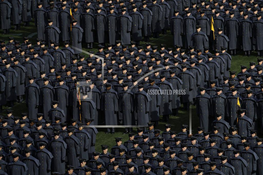 Matt Slocum Army cadets stand at attention after marching onto the field before an NCAA college football game against Navy, Saturday, Dec. 8, 2018, in Philadelphia. (AP Photo/Matt Slocum)
