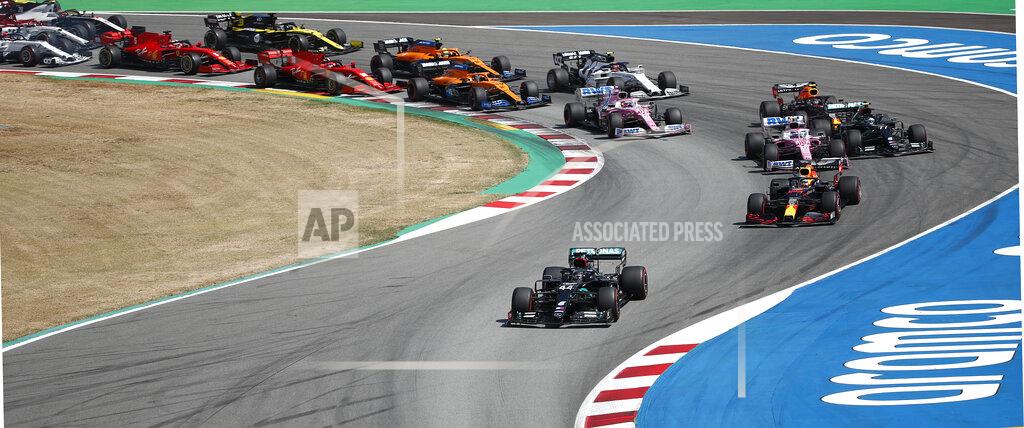 Emilio Morenatti Mercedes driver Lewis Hamilton of Britain leads the pack out of the 1st curve during the Formula One Grand Prix at the Barcelona Catalunya racetrack in Montmelo, Spain, Sunday, Aug. 16, 2020. (AP Photo, Emilio Morenatti, Pool)