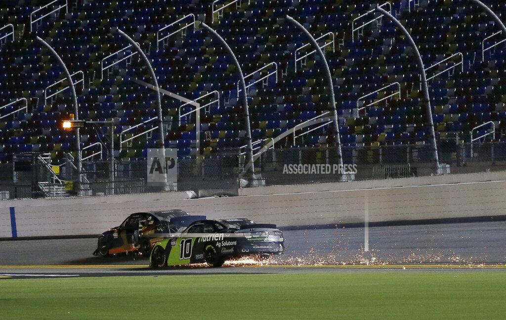 Terry Renna Ross Chastain (10) and Michael Annett (1) try to drive back to pit road after crashing on the last lap of a NASCAR Xfinity auto race at Daytona International Speedway, Friday, Aug. 28, 2020, in Daytona Beach, Fla. (AP Photo/Terry Renna)