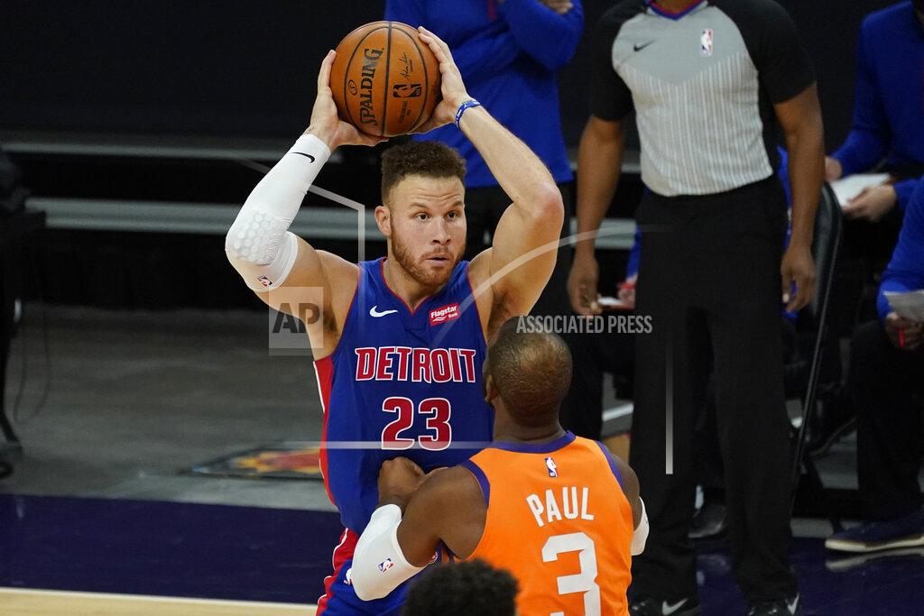 Matt York Detroit Pistons forward Blake Griffin (23) looks to pass over Phoenix Suns guard Chris Paul (3) during the first half of an NBA basketball game, Friday, Feb. 5, 2021, in Phoenix. (AP Photo/Matt York)