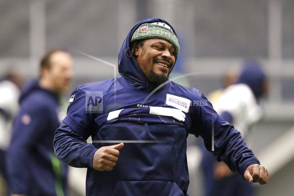 Elaine Thompson Seattle Seahawks running back Marshawn Lynch runs through warmups at the NFL football team's practice facility Tuesday, Dec. 24, 2019, in Renton, Wash. When Lynch played his last game for the Seahawks in 2016, the idea of him ever wearing a Seahawks uniform again seemed preposterous. Yet, here are the Seahawks getting ready to have Lynch potentially play a major role on Sunday against San Francisco with the NFC West title on the line. (AP Photo/Elaine Thompson)