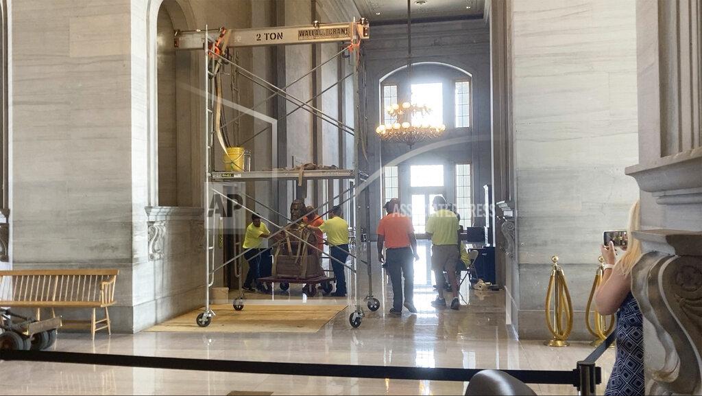 Kimberlee Kruesi The Nathan Bedford Forrest bust is removed from inside of the Tennessee Capitol on Friday, July 23, 2021 in Nashville. Tennessee’s State Building Commission voted 5-2 to remove the bust of the Confederate general and early Ku Klux Klan leader on Thursday, the final hurdle in a months-long process. (AP Photo/Kimberlee Kruesi)