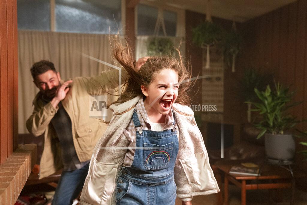 Ken Woroner This image released by Universal Pictures shows Zac Efron, left, and Ryan Kiera Armstrong in a scene from "Firestarter." (Ken Woroner/Universal Pictures via AP)