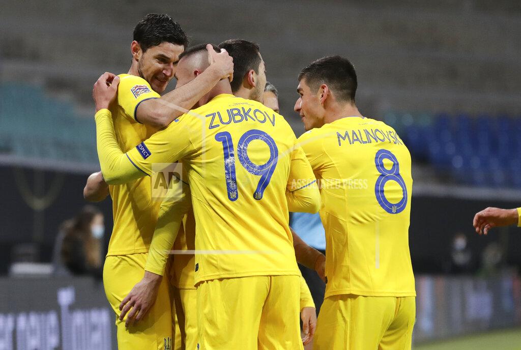Michael Sohn Ukraine players celebrate after their first goal during the UEFA Nations League soccer match between Germany and the Ukraine at the Red Bull Arena in Leipzig, Germany, Saturday, Nov. 14, 2020. (AP Photo/Michael Sohn)