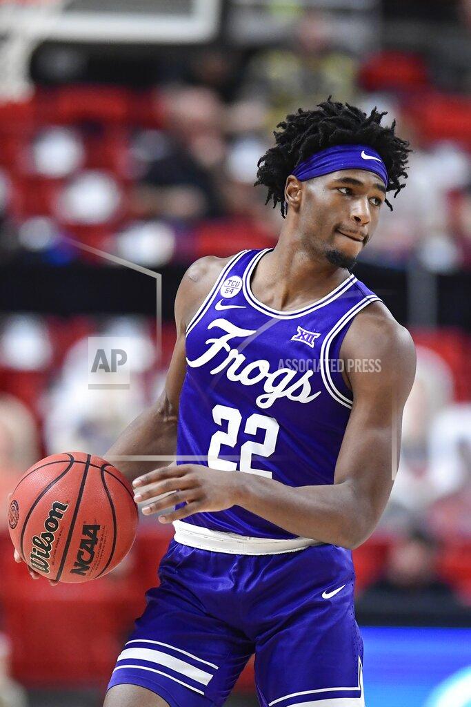 Justin Rex TCU's RJ Nembhard (22) controls the ball during the second half of an NCAA college basketball game against Texas Tech in Lubbock, Texas, Tuesday, March 2, 2021. (AP Photo/Justin Rex)