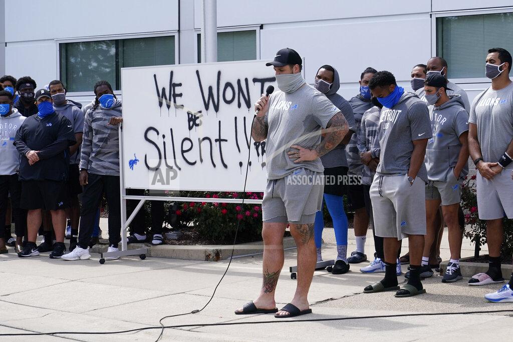 Carlos Osorio Detroit Lions offensive tackle Taylor Decker addresses the media with his teammates outside the Lions NFL football camp practice facility, Tuesday, Aug. 25, 2020, in Allen Park, Mich. The players were reacting to the recent shooting of Jacob Blake in Kenosha, Wis., on Sunday. (AP Photo/Carlos Osorio)
