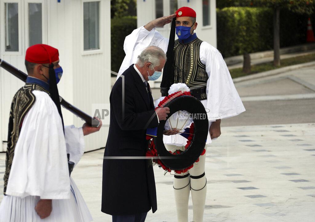 Yorgos Karahalis Britain's Prince Charles lays a wreath at the tomb of the Unknown Soldier in Athens, Thursday, March 25, 2021. Greece celebrates the bicentenary of the start of the country's war of independence against the Ottoman Empire. (AP Photo/Yorgos Karahalis)