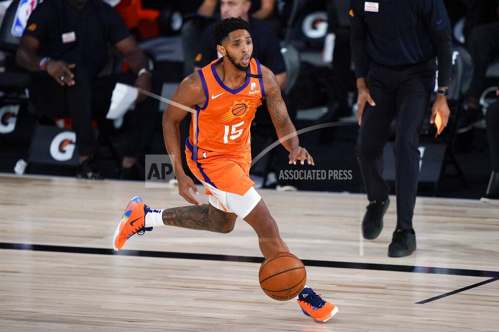 Ashley Landis Phoenix Suns guard Cameron Payne (15) brings the ball up court against the Dallas Mavericks during the second half of an NBA basketball game Sunday, Aug. 2, 2020, in Lake Buena Vista, Fla. (AP Photo/Ashley Landis, Pool)