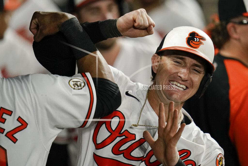Julio Cortez Baltimore Orioles' Austin Hays, right, is greeted in the dugout by Kelvin Gutierrez after hitting a two-run home run off New York Yankees relief pitcher Chad Green during the eighth inning of a baseball game, Wednesday, Sept. 15, 2021, in Baltimore. (AP Photo/Julio Cortez)