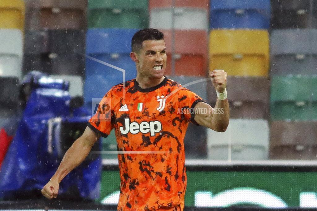 Andrea Bressanutti Juventus' Cristiano Ronaldo celebrates after scoring his second and winning goal during the Italian Serie A soccer match between Udinese and Juventus at the Dacia Arena stadium in Udine, Italy, Sunday, May 2, 2021. (Andrea Bressanutti/LaPresse via AP)