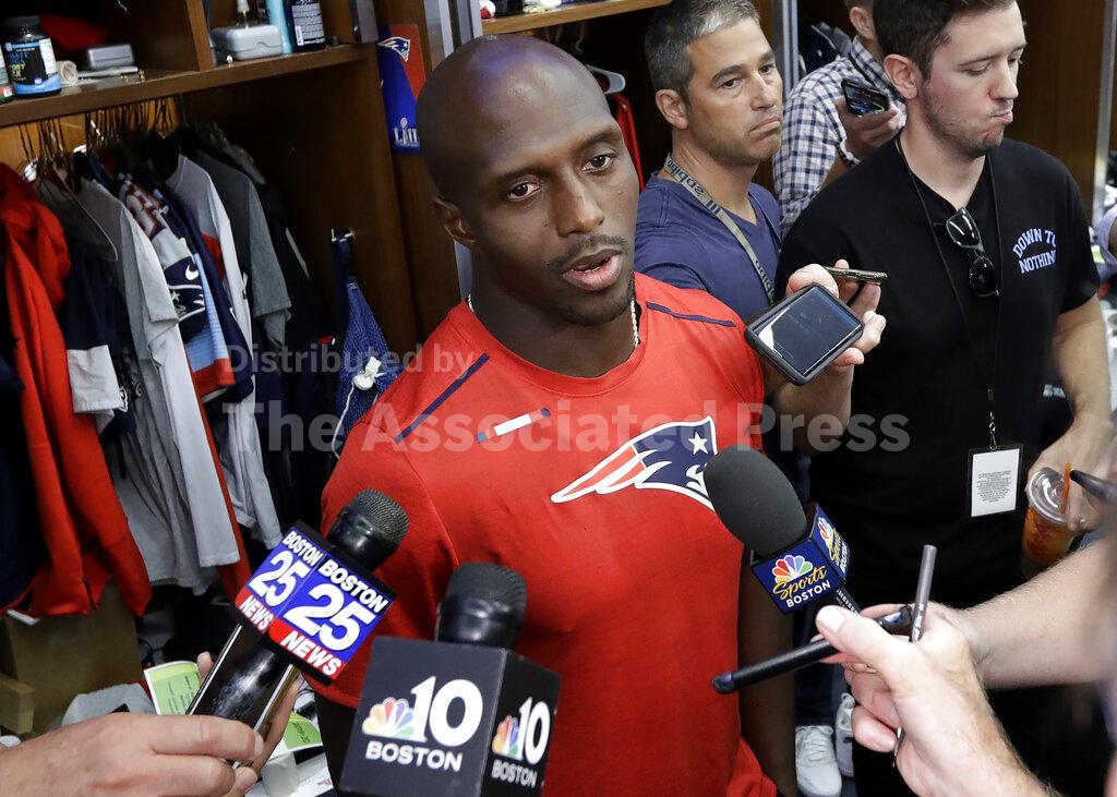 New England Patriots free safety Devin McCourty takes questions from reporters in the team's locker room following an NFL football practice, Wednesday, Sept. 11, 2019, in Foxborough, Mass. (AP Photo/Steven Senne)