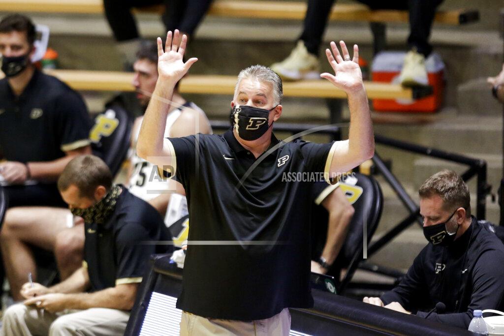 Nikos Frazier Purdue head coach Matt Painter motions to his team during the first half of an NCAA college basketball game against Oakland Tuesday, Dec. 1, 2020 in West Lafayette, Ind. (Nikos Frazier/Journal & Courier via AP)