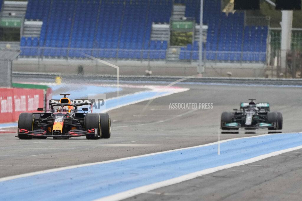Francois Mori Red Bull driver Max Verstappen of the Netherlands before crossing the finish line to win the French Formula One during the Grand Prix at the Paul Ricard racetrack in Le Castellet, southern France, Sunday, June 20, 2021. (AP Photo/Francois Mori)