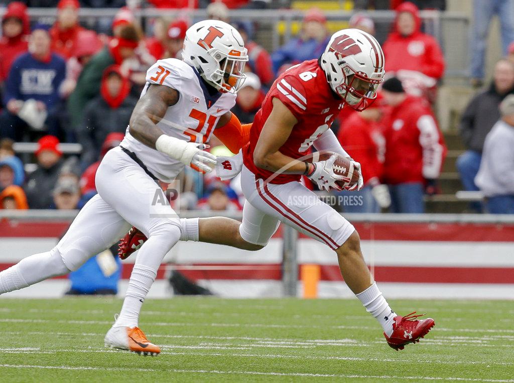 Andy Manis Wisconsin wide receiver Danny Davis (6) makes a reception against Illinois defensive back Cameron Watkins during the first half of an NCAA college football game Saturday, Oct. 20, 2018, in Madison, Wis. (AP Photo/Andy Manis)