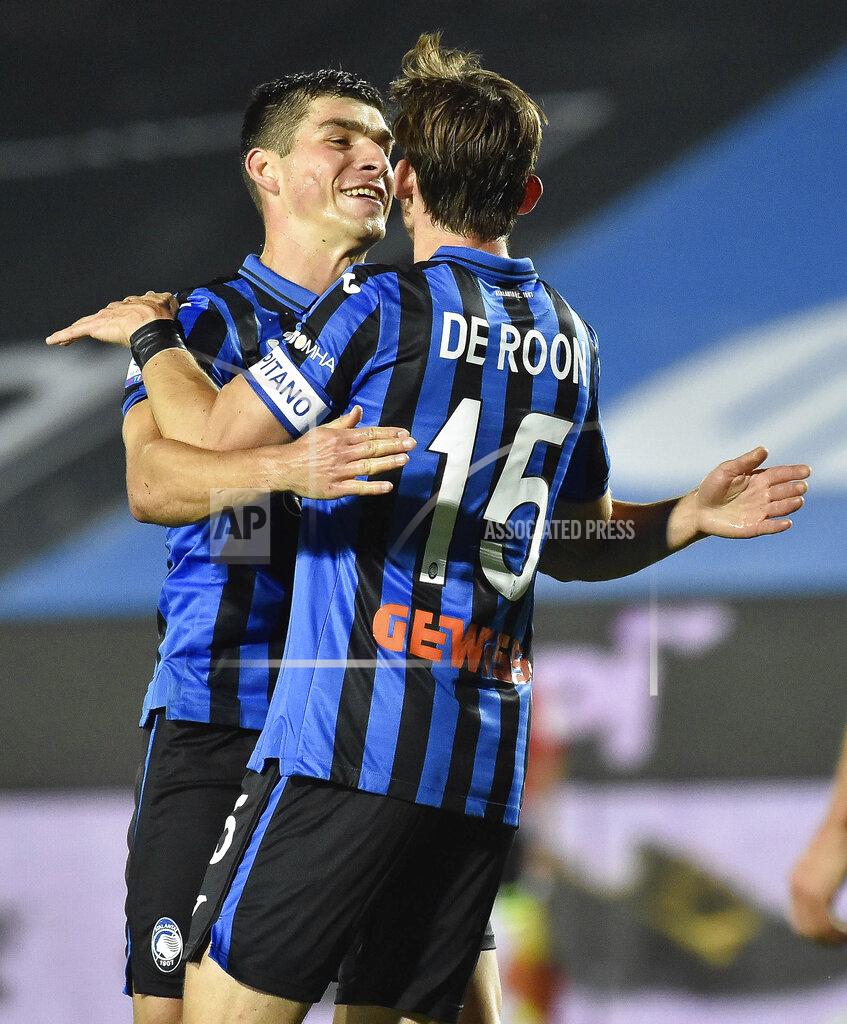 Gianluca Checchi Celebrating scoring a goal Atalanta's di Marten de Roon, with Gianluca Checchi during a Serie A soccer match between Atalanta and Brescia, at the Gewiss Stadium in Bergamo, Italy, Tuesday, July 14, 2020. (Gianluca Checchi/LaPresse via AP)