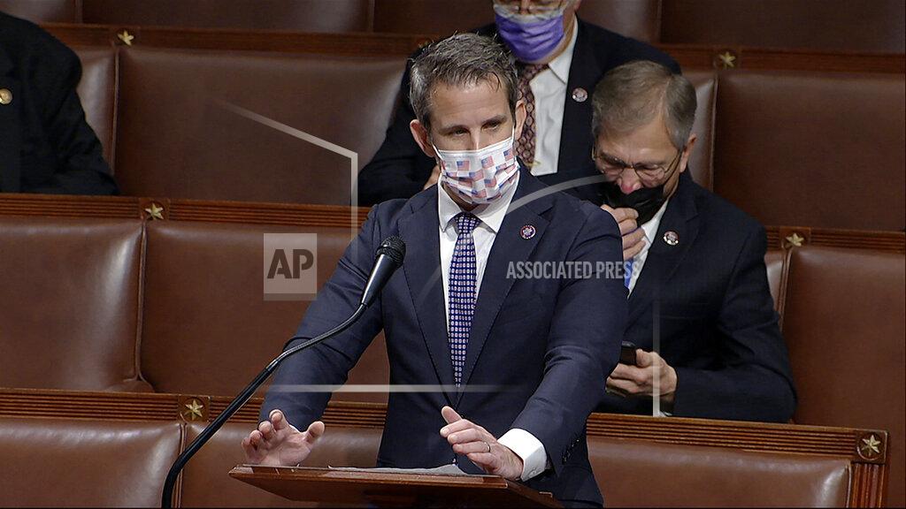In this image from video, Rep. Adam Kinzinger, R-Ill., speaks as the House debates the objection to confirm the Electoral College vote from Pennsylvania, at the U.S. Capitol early Thursday, Jan. 7, 2021. (House Television via AP)