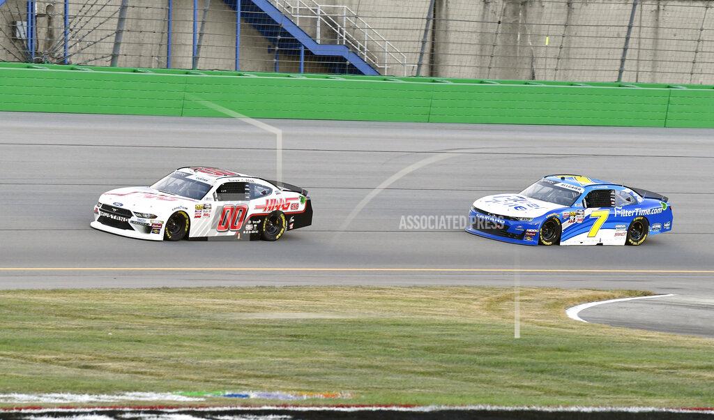 Timothy D. Easley Cole Custer (00) pulls away from the challenge of Justin Allgaier (7) during an Xfinity Series auto race at Kentucky Speedway in Sparta, Ky., Friday, July 12, 2019. (AP Photo/Timothy D. Easley)