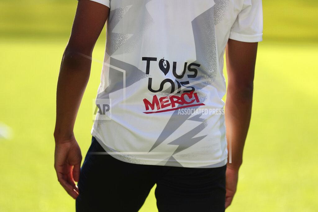 Thibault Camus Paris Saint Germain's Kylian Mbappe wears a t-shirt reading «All united » and «Thank you » to show appreciation for health workers during a training session prior to a friendly soccer match between Paris Saint Germain and Le Havre, in Le Havre, western France, Sunday, July 12, 2020. (AP Photo/Thibault Camus)