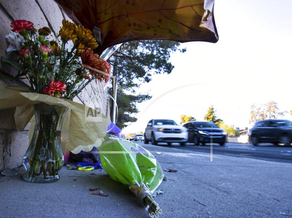 Bizuayehu Tesfaye A makeshift memorial to honor Tina Tintor, 23, is seen at South Rainbow Boulevard and Spring Valley Parkway, on Thursday, Nov. 4, 2021, in Las Vegas. Tintor and her dog were killed when former Raiders wide receiver Henry Ruggs, accused of DUI, slammed into the rear of Tintor's vehicle. (Bizuayehu Tesfaye/Las Vegas Review-Journal)