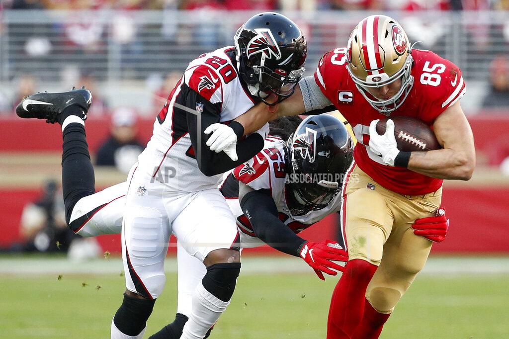 Josie Lepe San Francisco 49ers tight end George Kittle (85) runs against Atlanta Falcons defensive back Kendall Sheffield (20) and outside linebacker De'Vondre Campbell (59) during the second half of an NFL football game in Santa Clara, Calif., Sunday, Dec. 15, 2019. (AP Photo/Josie Lepe)