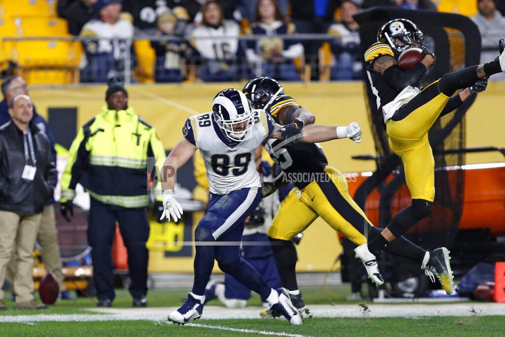 Keith Srakocic Pittsburgh Steelers cornerback Joe Haden, right, intercepts a pass intended for Los Angeles Rams tight end Tyler Higbee (89) during the second half of an NFL football game in Pittsburgh, Sunday, Nov. 10, 2019. (AP Photo/Keith Srakocic)
