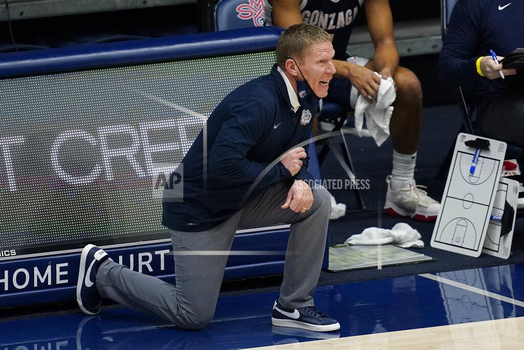 Jeff Chiu Gonzaga coach Mark Few yells to players during the first half of the team's NCAA college basketball game against Saint Mary's in Moraga, Calif., Saturday, Jan. 16, 2021. (AP Photo/Jeff Chiu)