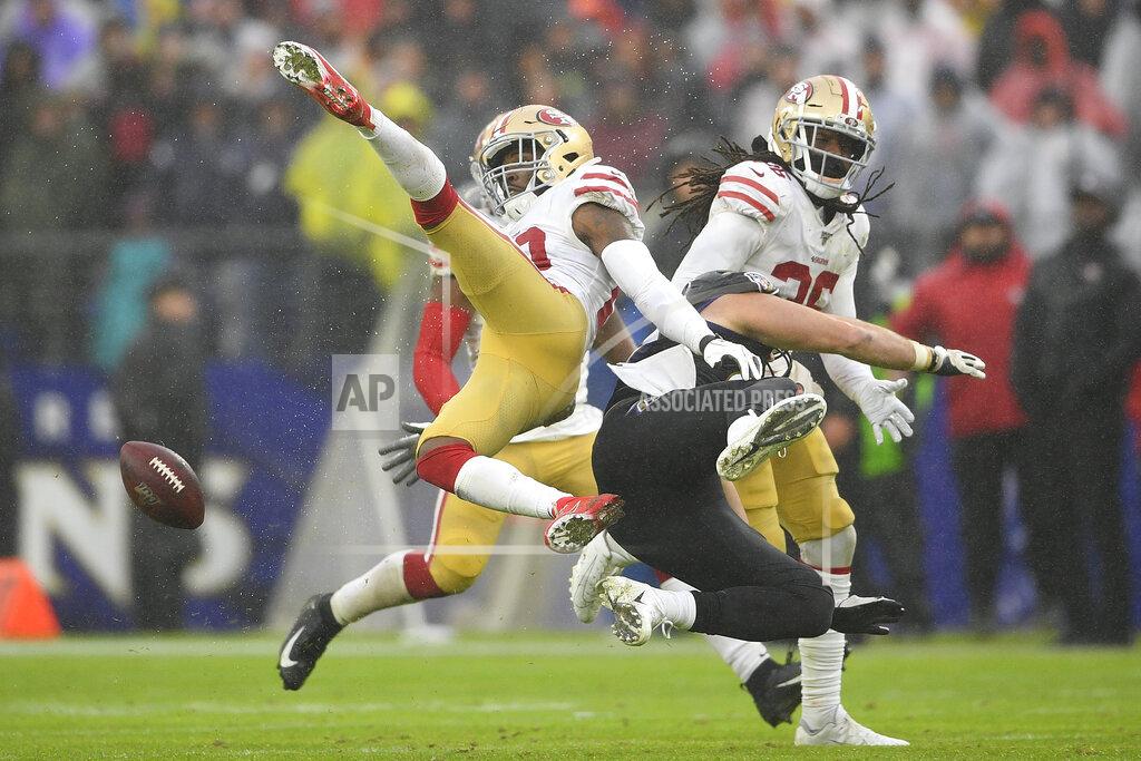 Nick Wass San Francisco 49ers free safety Jimmie Ward (20) looses control of the ball against Baltimore Ravens tight end Mark Andrews (89) in the second half of an NFL football game, Sunday, Dec. 1, 2019, in Baltimore, Md. (AP Photo/Nick Wass)