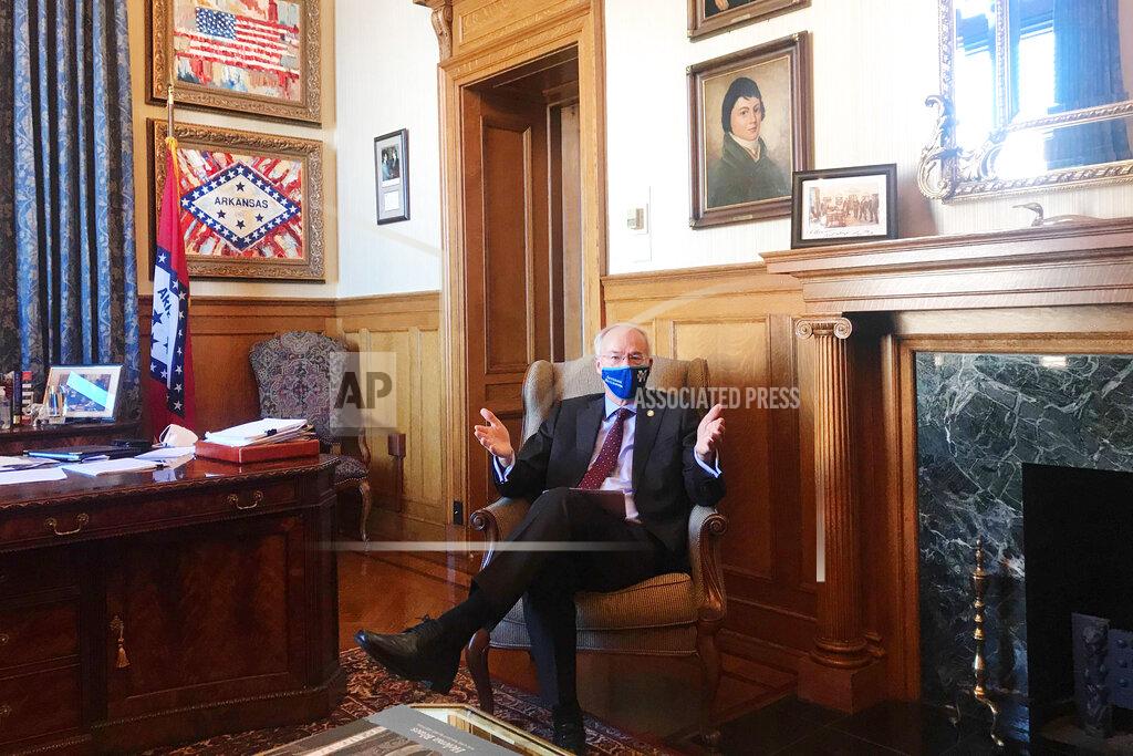 Andrew Demillo Arkansas Gov. Asa Hutchinson speaks in his office at the state Capitol in Little Rock, Ark. on Monday, Jan. 4, 2021. Hutchinson is advocating for a hate crimes bill in the upcoming legislative session, but the measure faces some obstacles. (AP Photo/Andrew DeMillo)