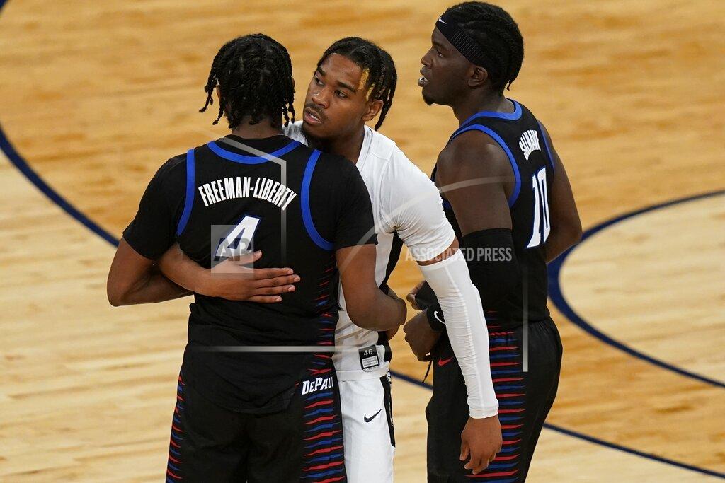 Frank Franklin Ii Providence's A.J. Reeves, center, hugs DePaul's Javon Freeman-Liberty (4) at after an NCAA college basketball game in the Big East conference tournament Wednesday, March 10, 2021, in New York. DePaul won 70-62. (AP Photo/Frank Franklin II)