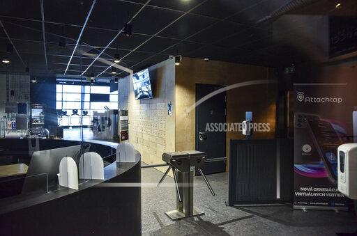 A closed fitness center at a shopping center in Bratislava, Slovakia, Thursday, Nov. 25, 2021. The Slovak government approved a two-week national lockdown amid a record surge of coronavirus infections. Prime Minister Eduard Heger said the measures, effective from Thursday, will target all, both unvaccinated and vaccinated. (Pavol Zachar/TASR via AP)