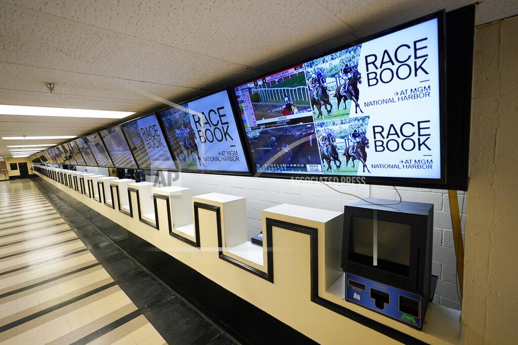 Steve Helber Betting windows are empty at Pimlico race track, Friday, Oct. 2, 2020, in Baltimore, Md., ahead Saturday's Black-Eyed Susan and Preakness Stakes races. (AP Photo/Steve Helber)