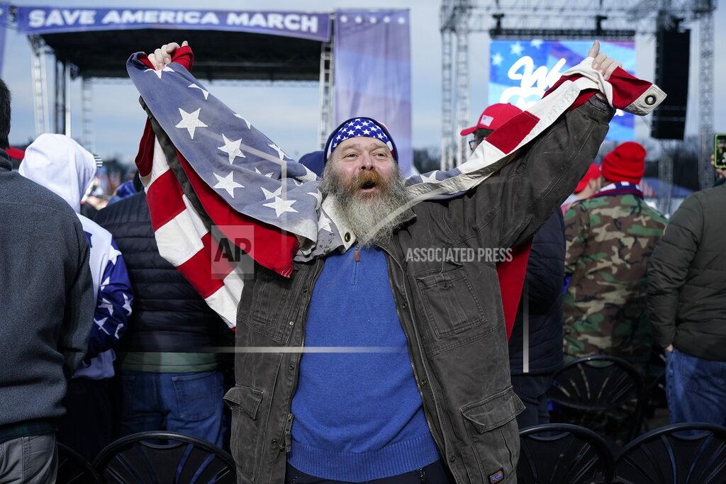 Joseph Baker of Cape May, N.J., cheers as he waits for speakers Wednesday, Jan. 6, 2021, in Washington, at a rally in support of President Donald Trump called the "Save America Rally." (AP Photo/Jacquelyn Martin)