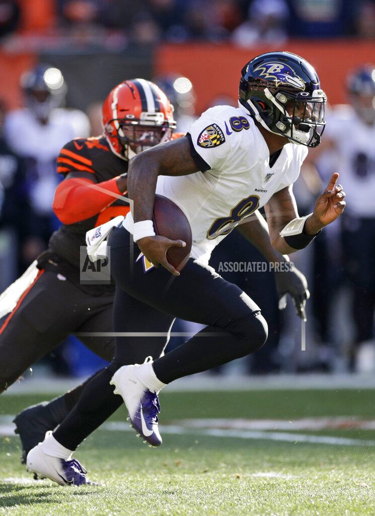 Ron Schwane Baltimore Ravens quarterback Lamar Jackson rushes against the Cleveland Browns during the first half of an NFL football game, Sunday, Dec. 22, 2019, in Cleveland. (AP Photo/Ron Schwane)