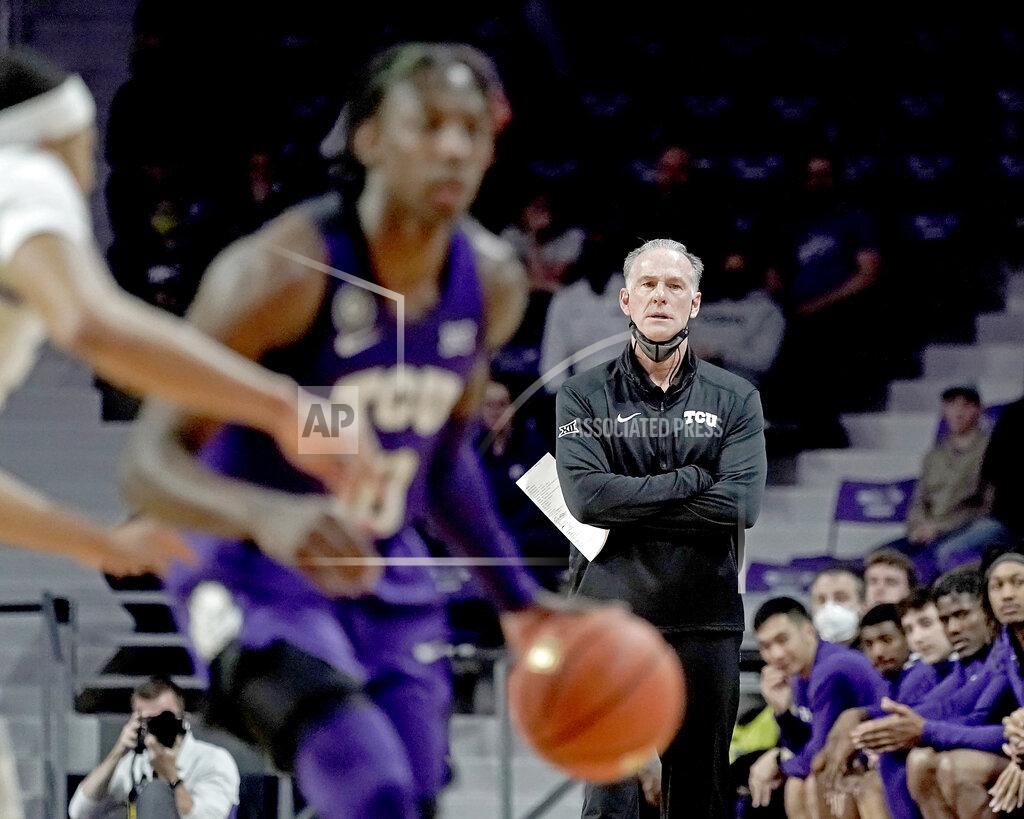 Charlie Riedel TCU head coach Jamie Dixon watches during the first half of an NCAA college basketball game against Kansas State Wednesday, Jan. 12, 2022, in Manhattan, Kan. (AP Photo/Charlie Riedel)