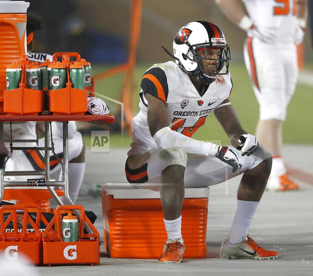 Tony Avelar Oregon State cornerback Kaleb Hayes (14) sits on the sidelines during the last minutes against Stanford in an NCAA college football game on Saturday, Nov. 10, 2018, in Stanford, Calif. Stanford won 48-17. (AP Photo/Tony Avelar)
