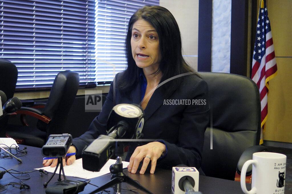 FILE - In this March 5, 2020, file photo, Michigan Attorney General Dana Nessel addresses the media during a news conference in Lansing, Mich. Nessel opened an investigation Monday, Sept. 28, 2020, into allegations that a ballot group may have committed crimes while gathering signatures to repeal a law that gives Gov. Gretchen Whitmer broad powers to manage the coronavirus crisis. Nessel, a Democrat, said her office will probe Unlock Michigan, a Republican-affiliated committee that plans to submit its signatures Friday. If the group turns in enough — it needs 340,000 valid signatures — the initiative will go to the Legislature. (AP Photo/David Eggert, File)