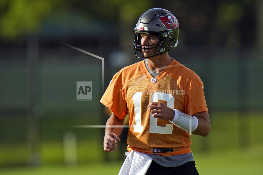 Chris O'meara Tampa Bay Buccaneers quarterback Tom Brady (12) runs during an NFL football practice Tuesday, July 27, 2021, in Tampa, Fla. (AP Photo/Chris O'Meara)