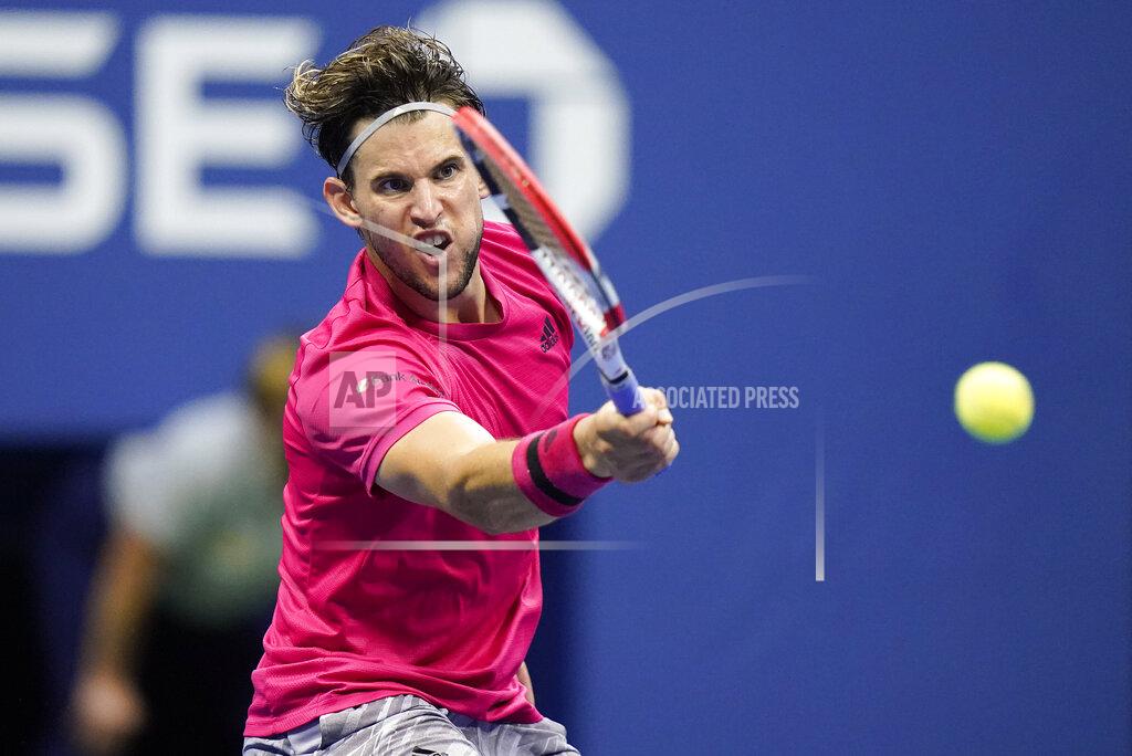 Frank Franklin Ii Dominic Thiem, of Austria, returns a shot to Alexander Zverev, of Germany, during the men's singles final of the US Open tennis championships, Sunday, Sept. 13, 2020, in New York. (AP Photo/Frank Franklin II)