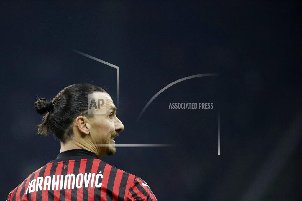 Luca Bruno FILE - In this Feb. 13, 2020 file photo, AC Milan's Zlatan Ibrahimovic looks around during an Italian Cup soccer match between AC Milan and Juventus at the San Siro stadium, in Milan, Italy. Ibrahimovic returned to Milan late Saturday Aug. 29, 2020 and ready to sign a new contract with AC Milan. The 38-year-old Ibrahimović is expected to sign a one-season deal worth 7 million euros ($8.3 million). (AP Photo/Luca Bruno, file)