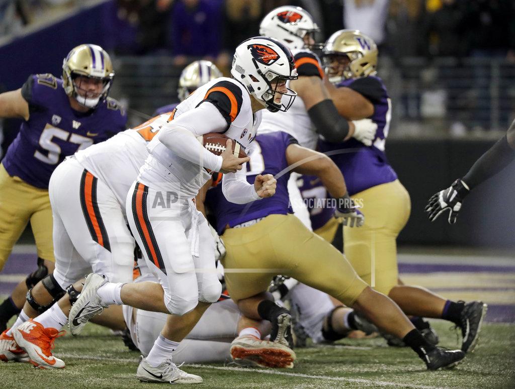 Elaine Thompson Oregon State quarterback Jack Colletto carries for a touchdown against Washington in the second half of an NCAA college football game Saturday, Nov. 17, 2018, in Seattle. (AP Photo/Elaine Thompson)