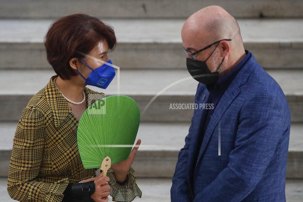 Salvatore Laporta South Korea minister of environment, Han Jeoung-ae is welcomed by Italian Minister for Ecological Transition Roberto Cingolani as she arrives at Palazzo Reale in Naples, Italy, Thursday, July 22, 2021, to take part in a G20 meeting on environment, climate and energy. (AP Photo/Salvatore Laporta)