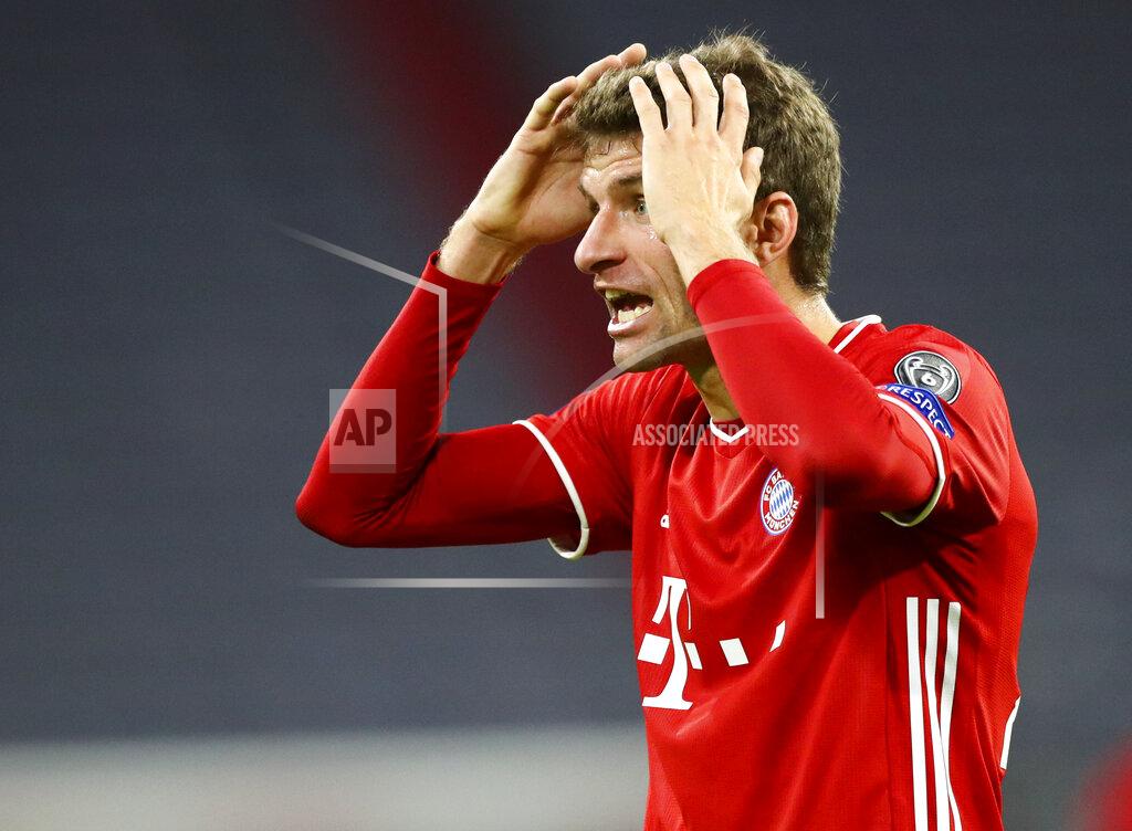 Matthias Schrader Bayern Munich's Thomas Müller reacts during the Champions League Group A soccer match between Bayern Munich and Atletico Madrid at the Allianz Arena in Munich, Germany, Wednesday, Oct. 21, 2020. (AP Photo/Matthias Schrader,Pool)